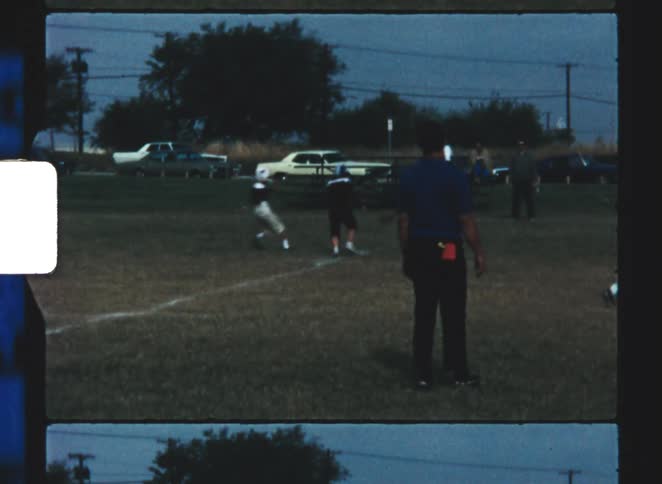 A group of kids playing football