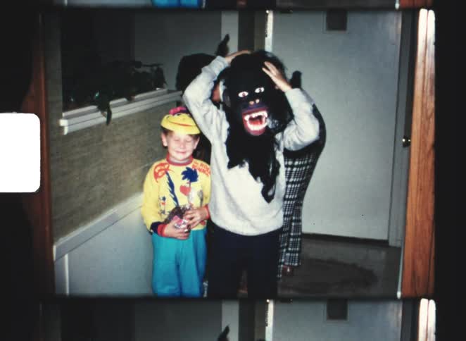 Children are putting on halloween costumes