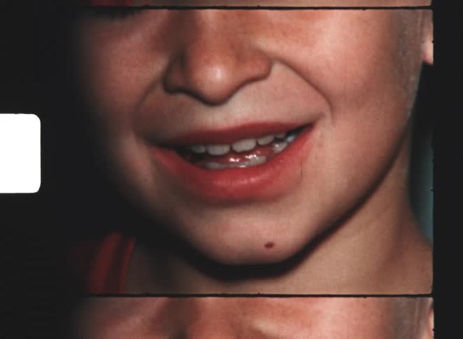 Boy holding a tooth