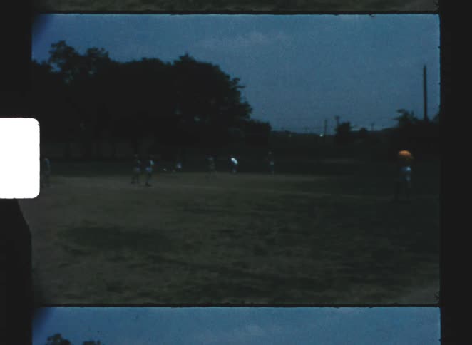 A group of kids playing on a field