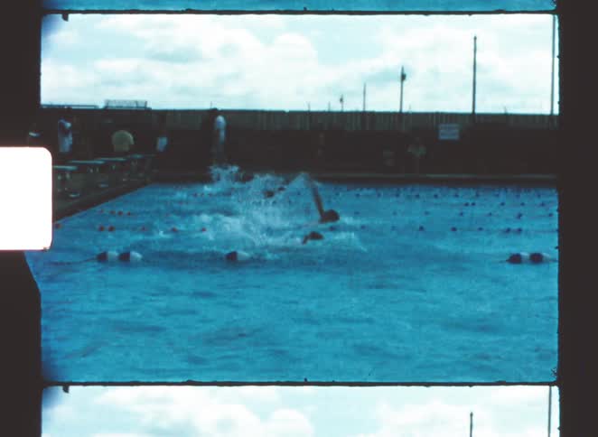 A view of people swimming in a pool