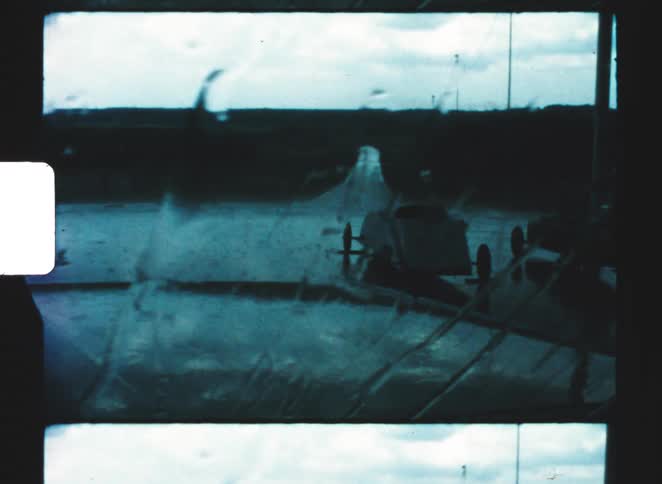 Heavy rain pours outside and falls on the glass