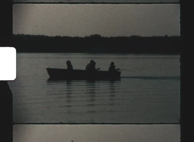 A group of people rowing a boat
