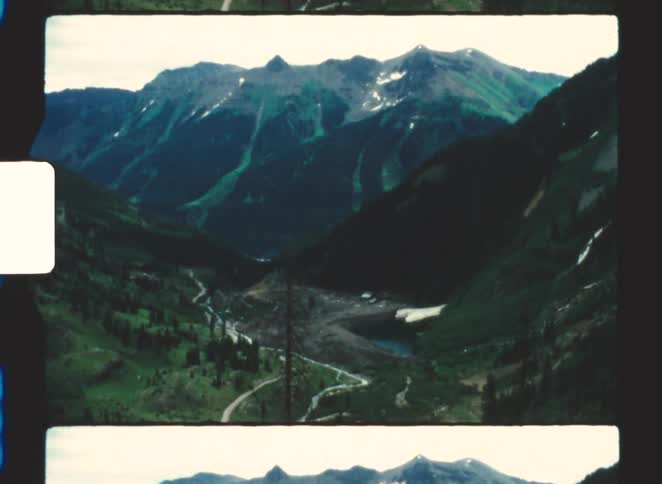 A trail leads to the large mountain range
