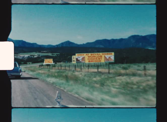 Large banners are on the side of the road