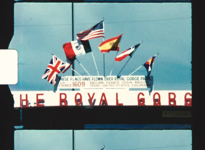 royal gorge 1970  Wind is blowing the flags on the sign