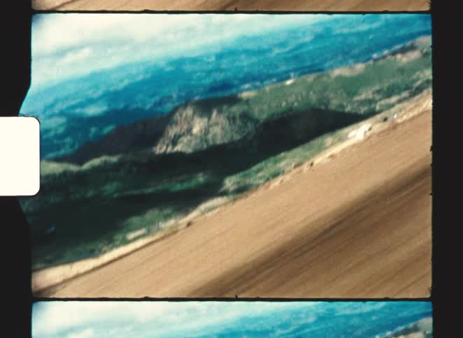 The dirt trail runs on the cliff of the mountain