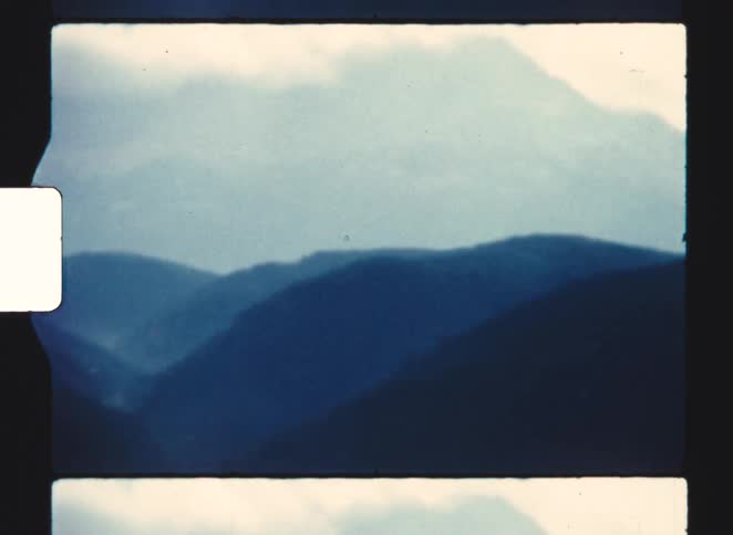 A view of some mountains during the day