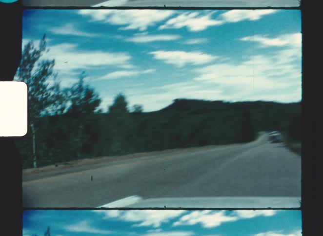 A view of cars driving on a road