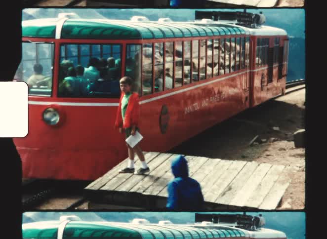 pikes peak colorado springs 1970  Vintage footage shows a young boy standing on a wooden platform beside the vibrant red manitou and pikes peak railway cog train which is packed with passengers on the steep rocky mountainside