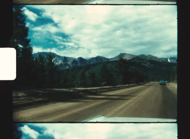 A view of driving near some mountains