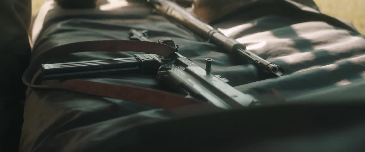 Two weapons are laying together