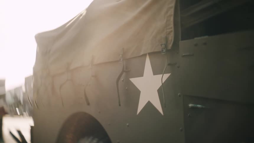 The military truck has a white star on the side