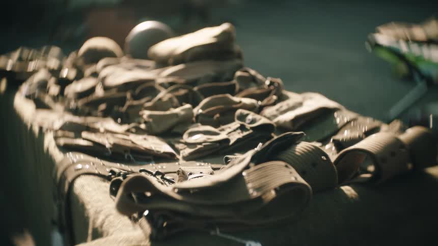 The box is covered with belts and equipment