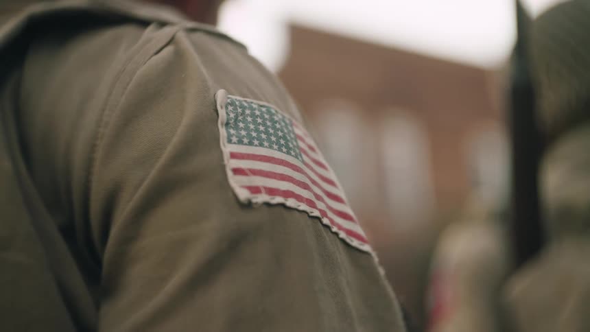 A close up of a patch on a persons jacket