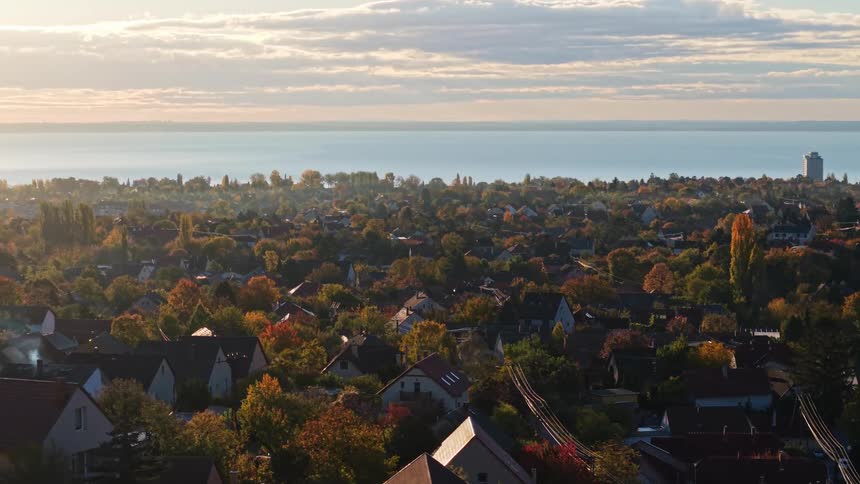 Aerial of a coastal housing neighborhood on an autumn day