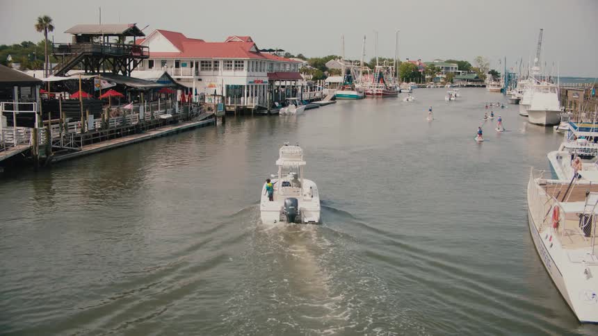 A view of some boats in a canal