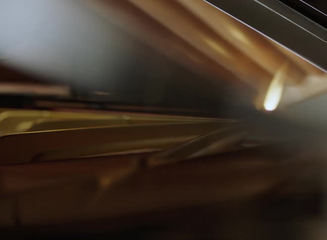A view of the inside of a piano