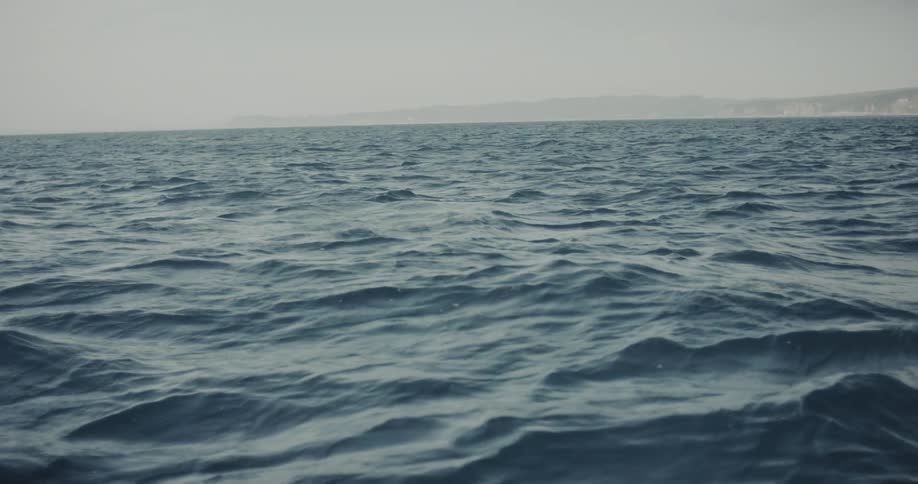 Water ripples and waves off the coast