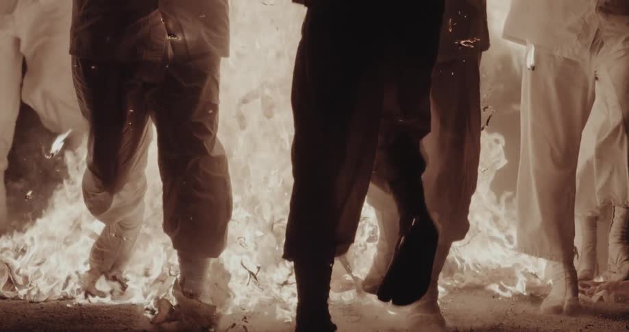 A group of people running through a fire
