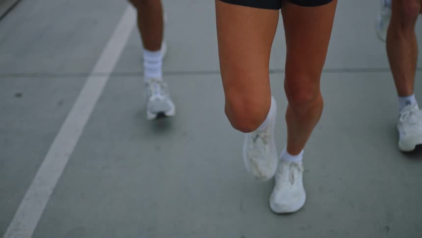 A group of people running outdoors