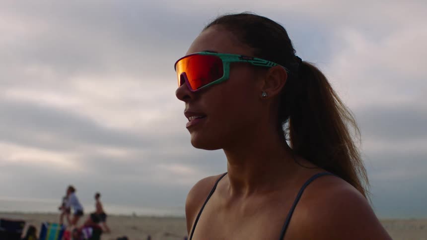 Woman wearing sunglasses on the beach