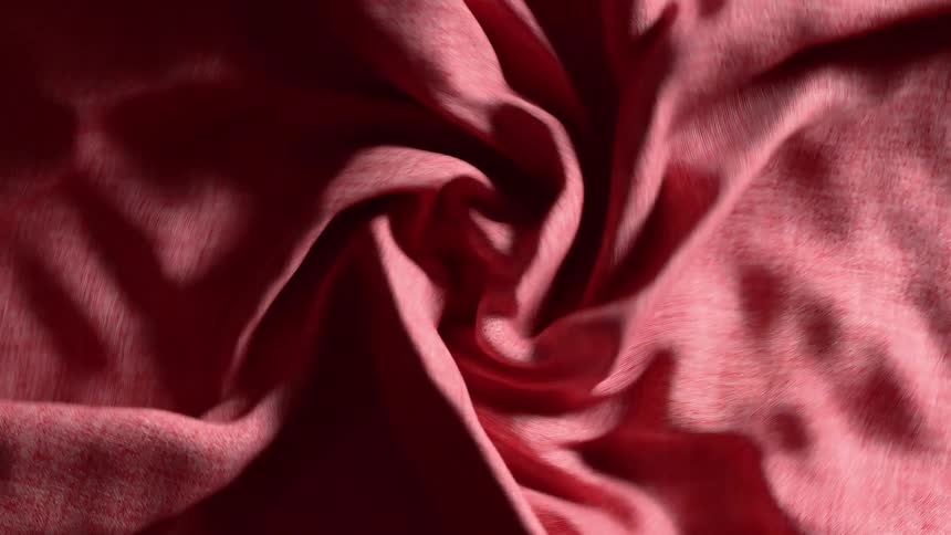 The fabric spins and twists