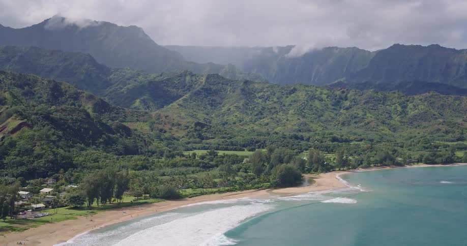 There are a few shelters on the shore of the tropical island