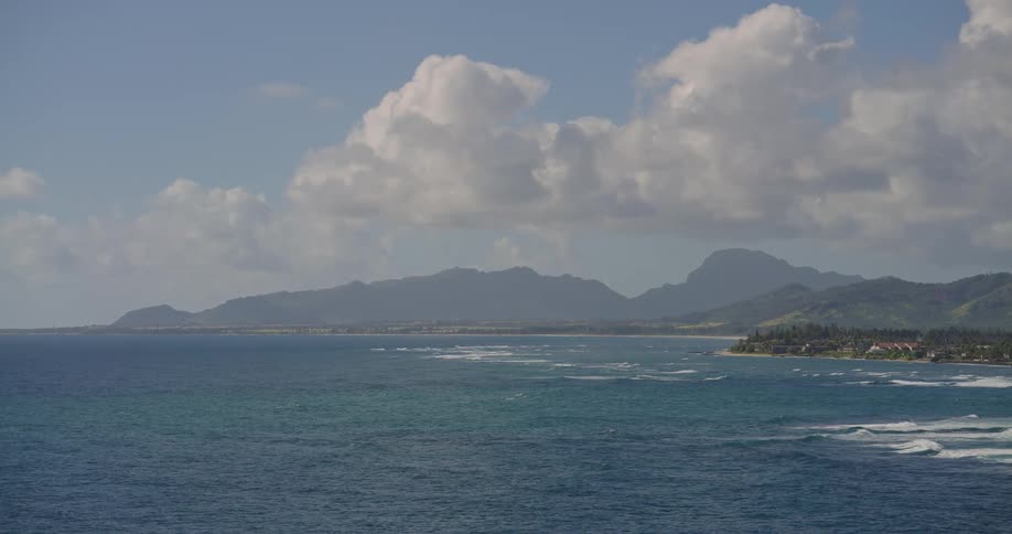 A view of waves rushing towards the coast