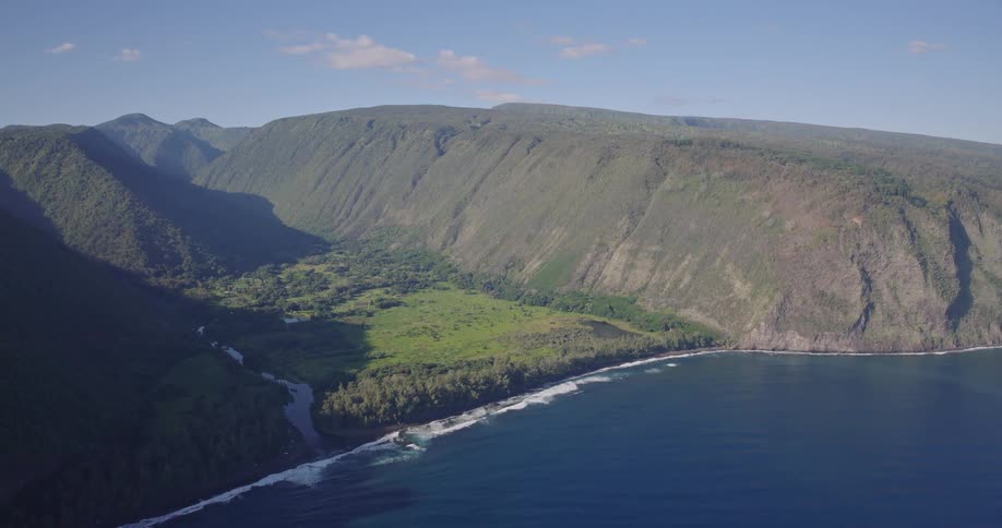 The island is surrounded by blue water