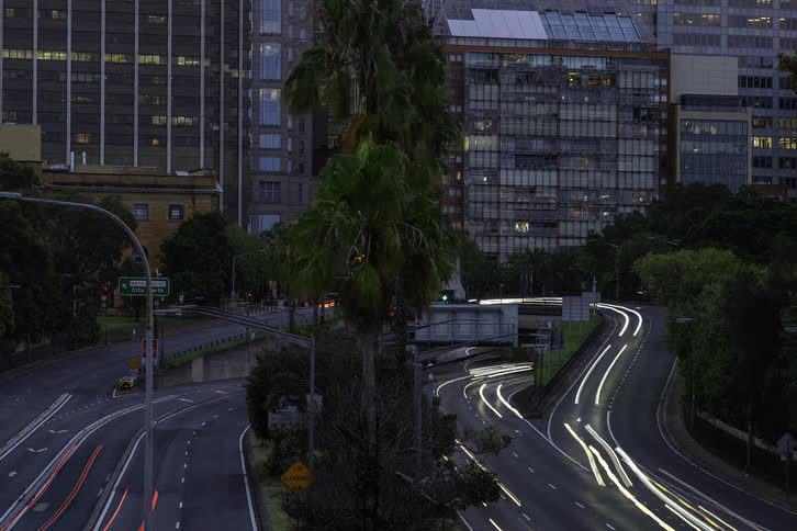 A view of cars driving in a city
