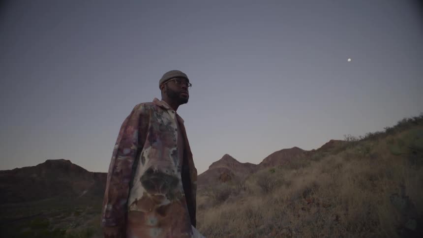 The man is hiking on the mountain hill