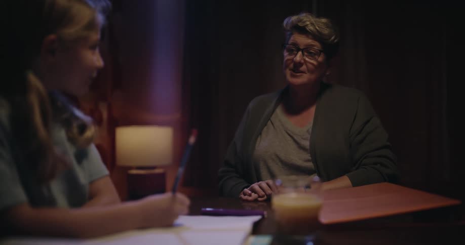 A mother and daughter doing homework