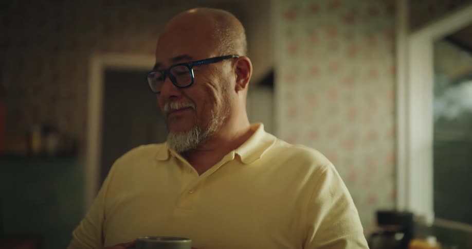 Family in the kitchen with happy expressions