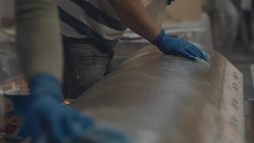 The workers are cleaning the equipment