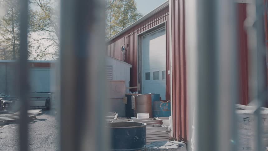 The yard of the storage facility has many items