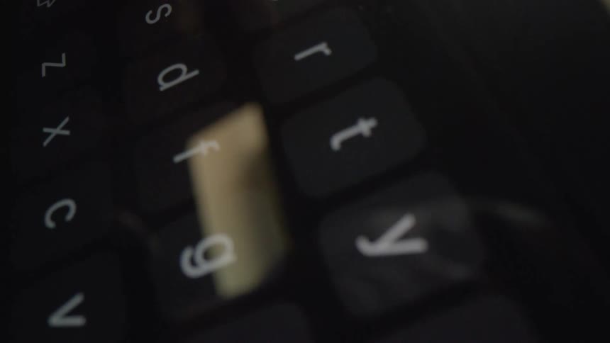 A person typing on a smartphone