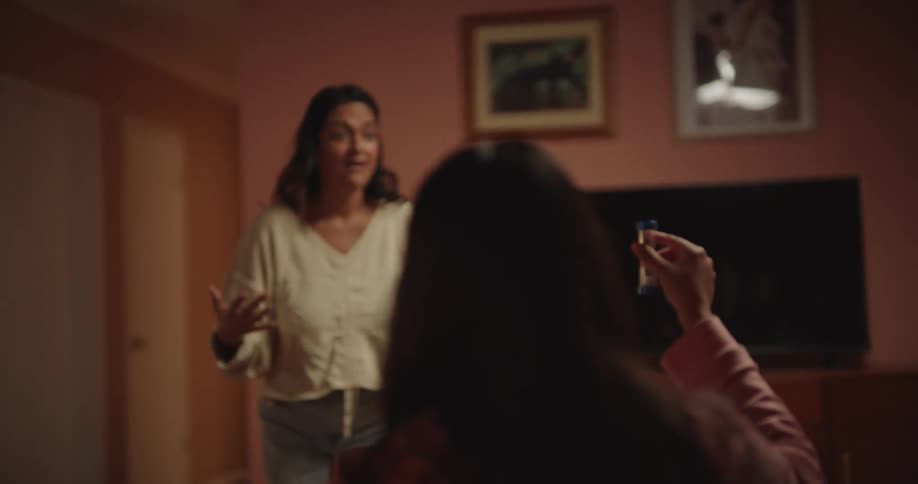 A mother talking and joking with her kids