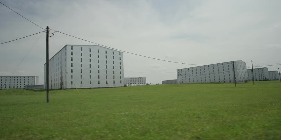 Power lines are on this field before some housing buildings