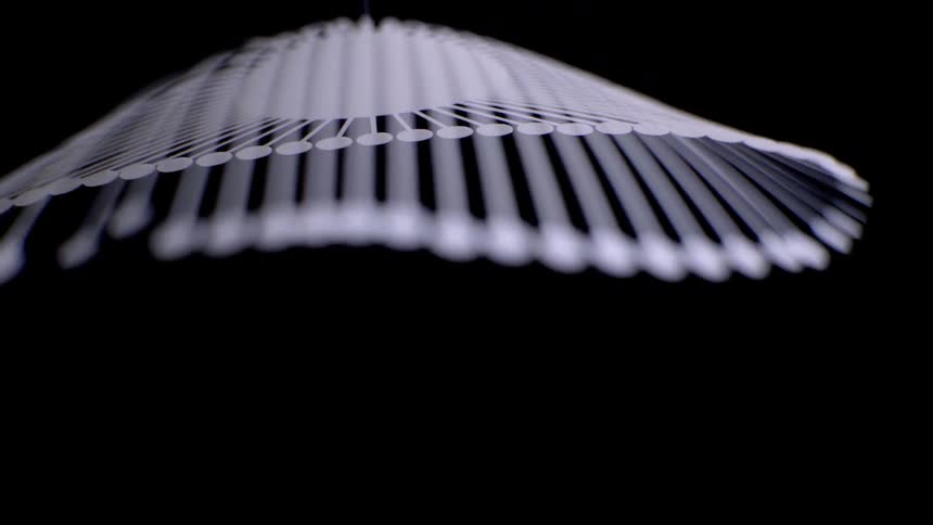 Abstract object with white lines against a black background