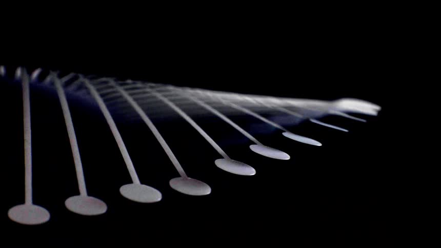 Abstract smooth white strands creating a flowing abstract arc on a black background