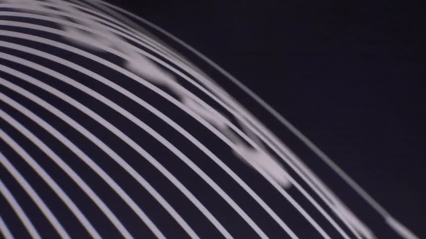 Abstract line pattern against a dark background