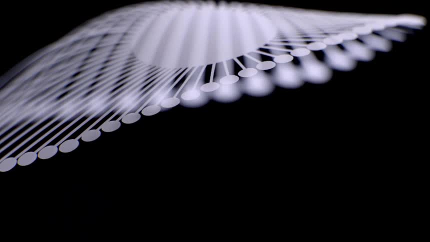 A chandelier dangling from the ceiling inside a dark room