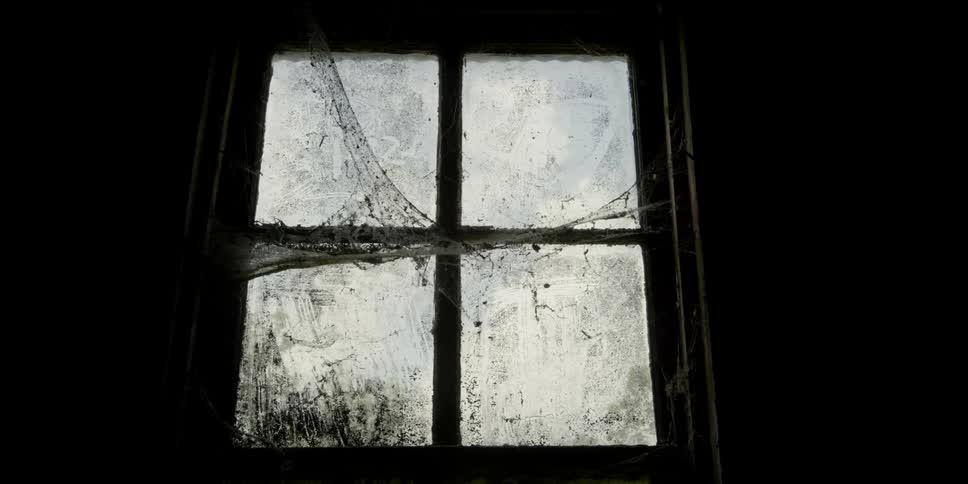 A dusty grimy window
