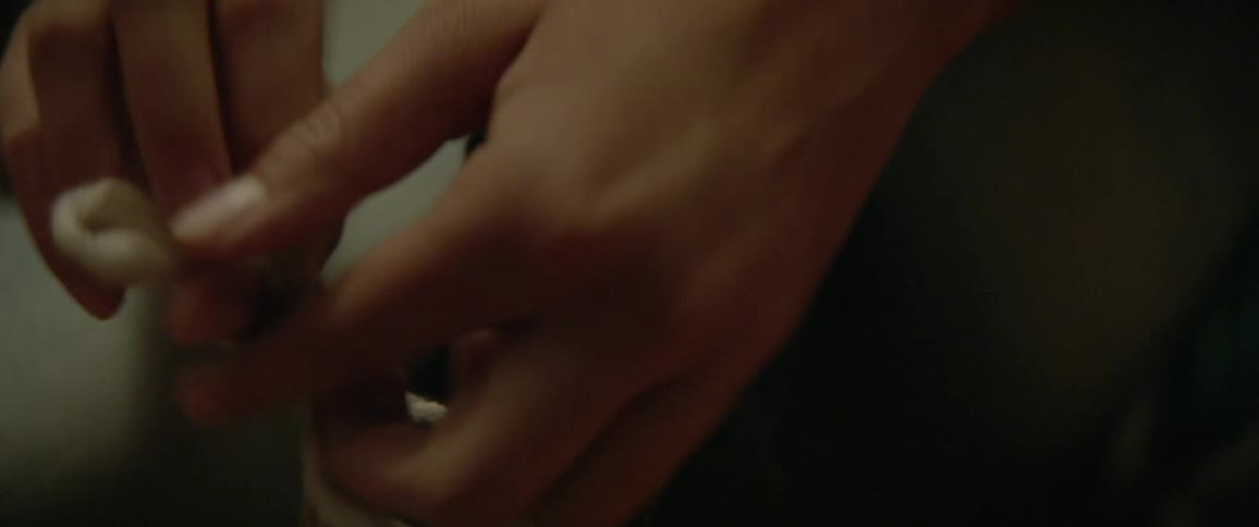 A person tying their shoe