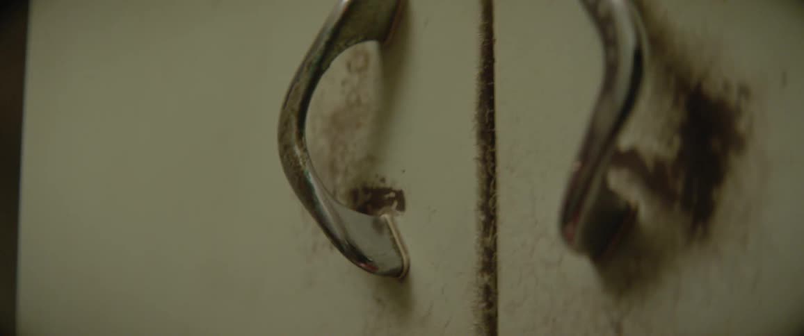 Close up of rusty old cupboard door handles
