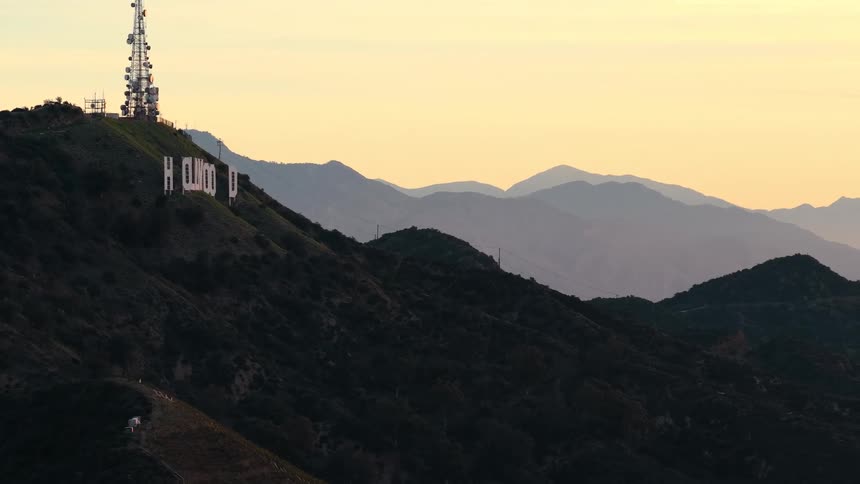 The hollywood sign stands on mount lee at sunset