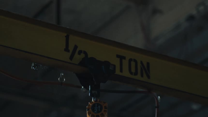 The crane moves in the warehouse