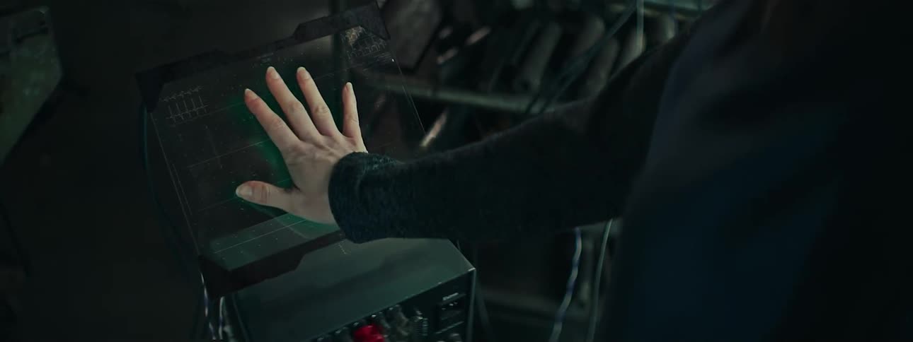 Womans hand on a digital panel
