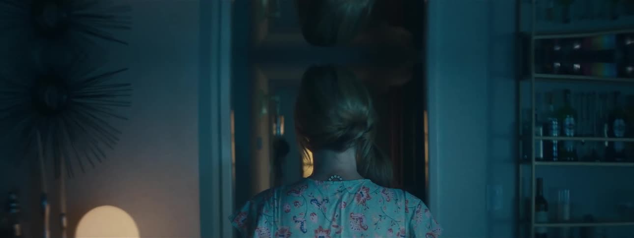 A woman standing in a room
